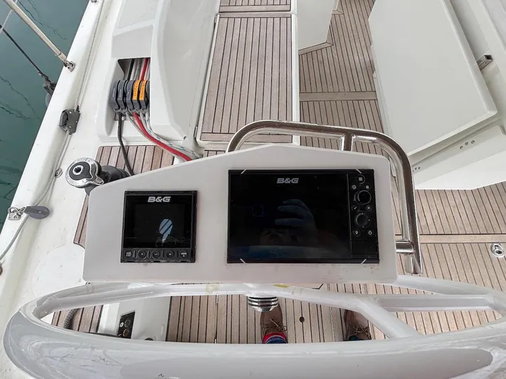 Blue Satellite Yacht Photos Pics Steering console of 2019 Beneteau Oceanis 46.1 with B&G navigation displays.