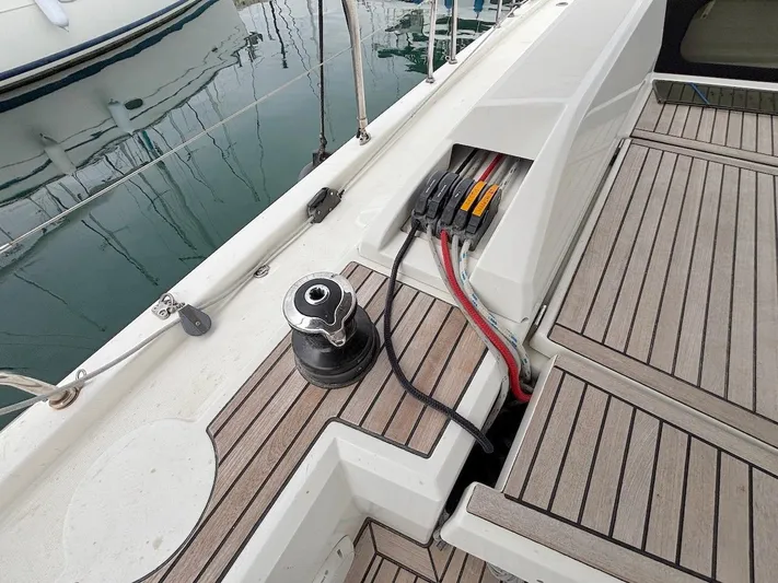 Blue Satellite Yacht Photos Pics Deck of 2019 Beneteau Oceanis 46.1 yacht with winch and cables.
