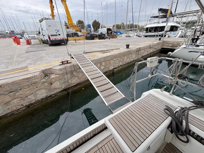 Blue Satellite Yacht Photos Pics Beneteau Oceanis 46.1 yacht docked with gangway, marina view, 2019 model.