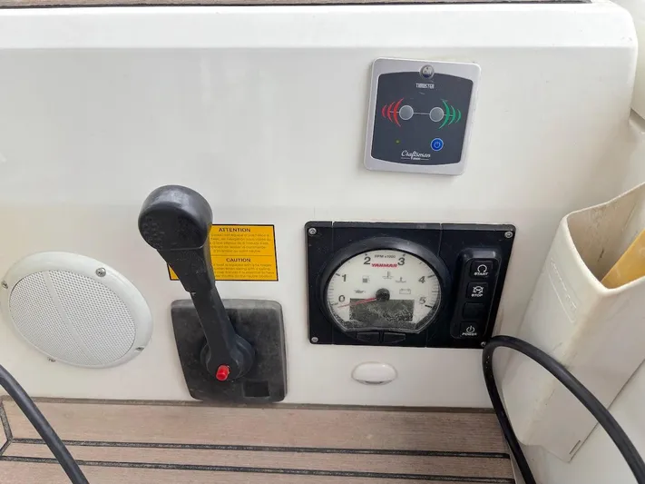 Blue Satellite Yacht Photos Pics Control panel of a 2019 Beneteau Oceanis 46.1 sailboat with throttle and gauges.