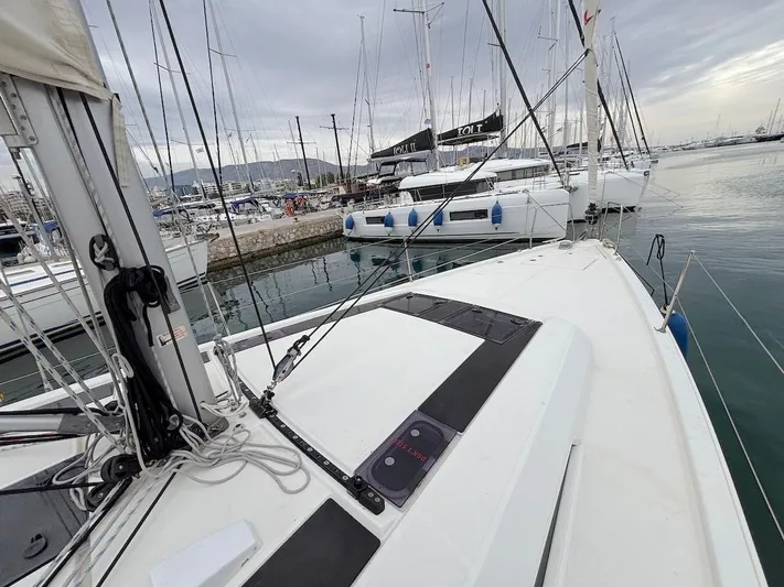 Blue Satellite Yacht Photos Pics Beneteau Oceanis 46.1 sailboat docked in a marina, 2019 model.