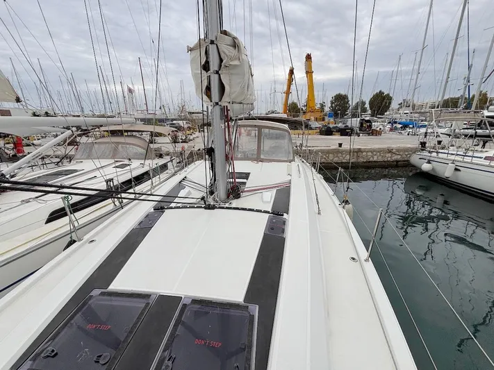 Blue Satellite Yacht Photos Pics Beneteau Oceanis 46.1 sailboat docked in marina, 2019 model, overcast sky.