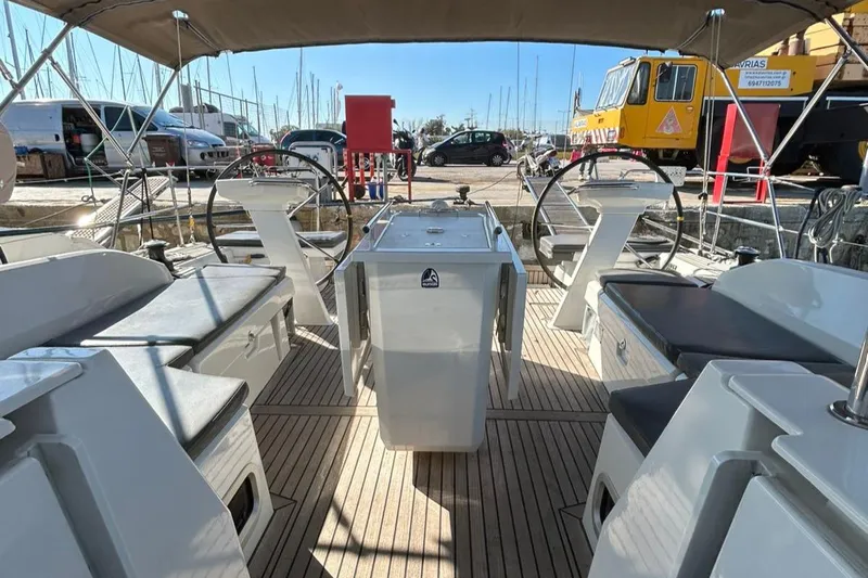 Blue Satellite Yacht Photos Pics Spacious cockpit of 2019 Beneteau Oceanis 46.1 sailboat with dual steering wheels.