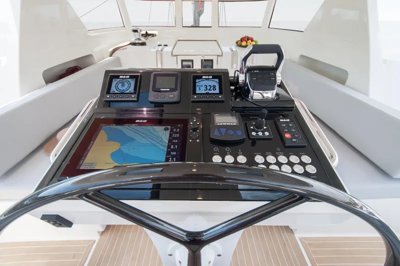 Savoir Faire Yacht Photos Pics Helm of 2025 MCP Yachts GLOBAL EXP 68 with advanced navigation controls.