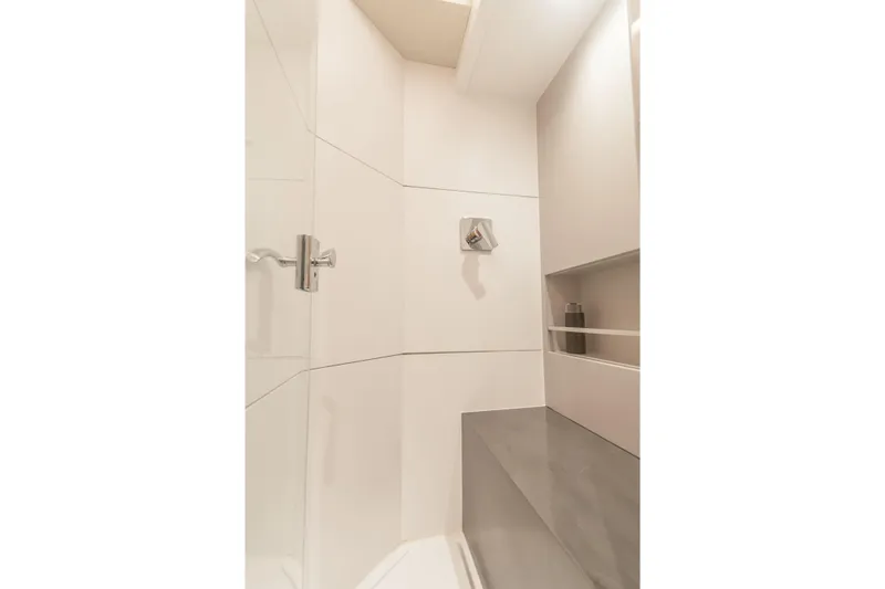 Savoir Faire Yacht Photos Pics Modern shower area in 2025 MCP Yachts GLOBAL EXP 68, featuring sleek design and fixtures.