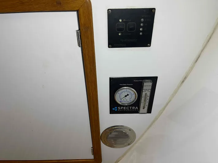 Galileo Yacht Photos Pics Control panel and gauge on 2000 Manta 42 Catamaran interior wall.