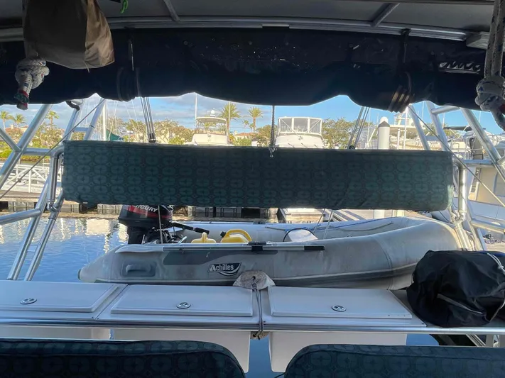 Galileo Yacht Photos Pics Manta 42 Catamaran 2000 with dinghy at marina, view from cockpit.