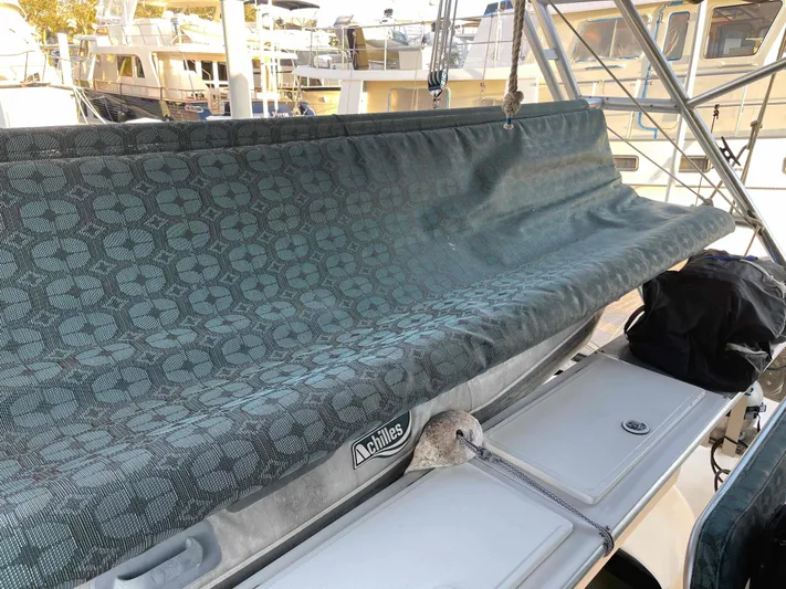 Galileo Yacht Photos Pics Manta 42 Catamaran 2000 with covered seating area, docked at marina.