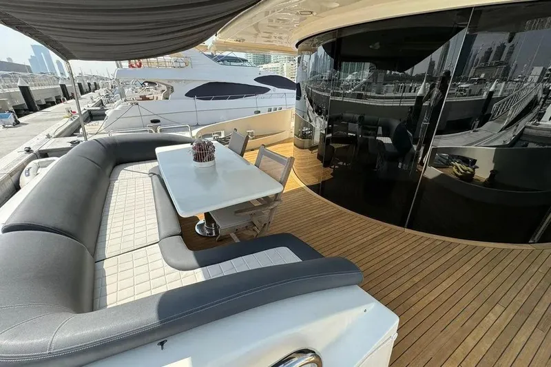  Yacht Photos Pics Luxurious Azimut 98 Leonardo yacht deck with seating and dining area, 2003 model.