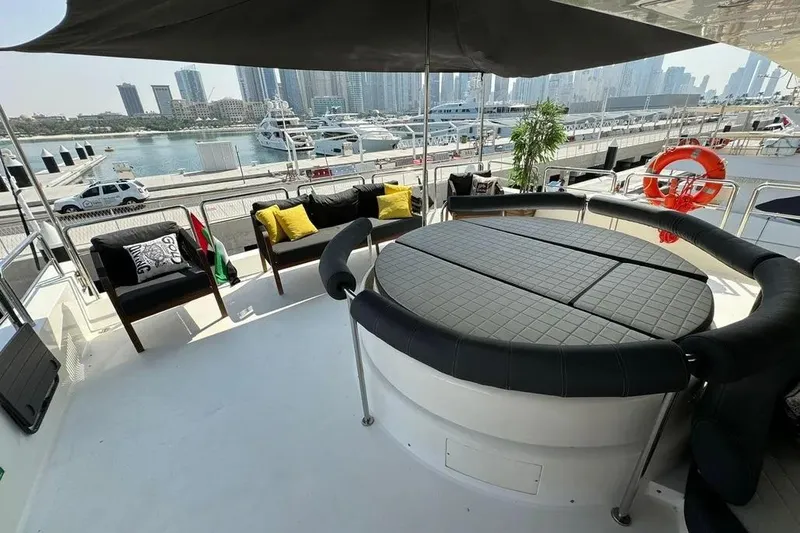  Yacht Photos Pics Luxurious deck of 2003 Azimut 98 Leonardo yacht with seating and marina view.