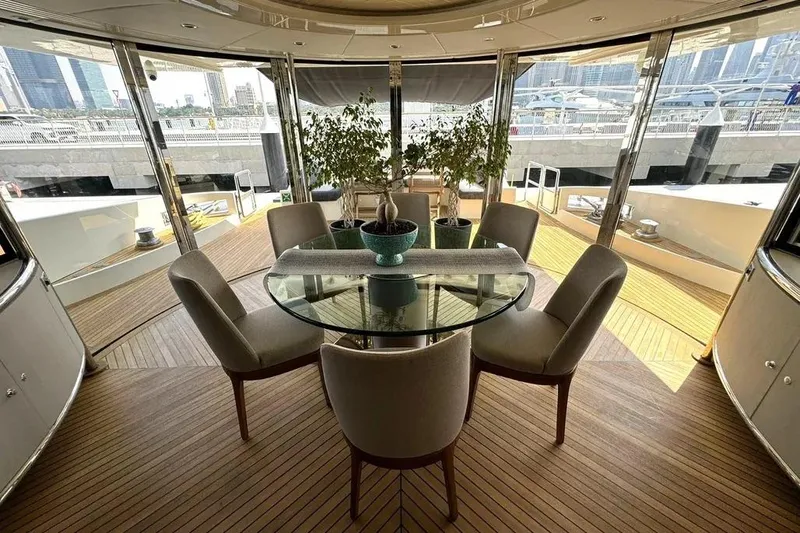  Yacht Photos Pics Luxurious 2003 Azimut 98 Leonardo yacht interior with elegant dining area and panoramic views.