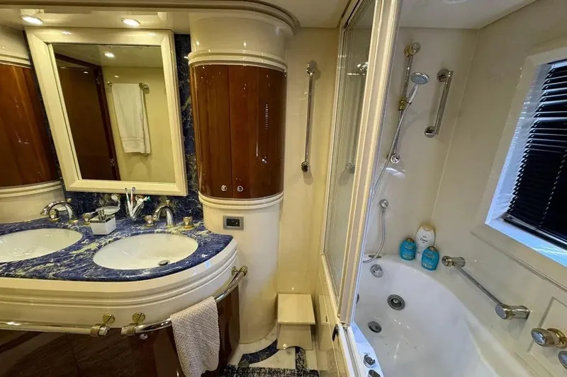  Yacht Photos Pics Luxurious bathroom in 2003 Azimut 98 Leonardo yacht with dual sinks and elegant fixtures.