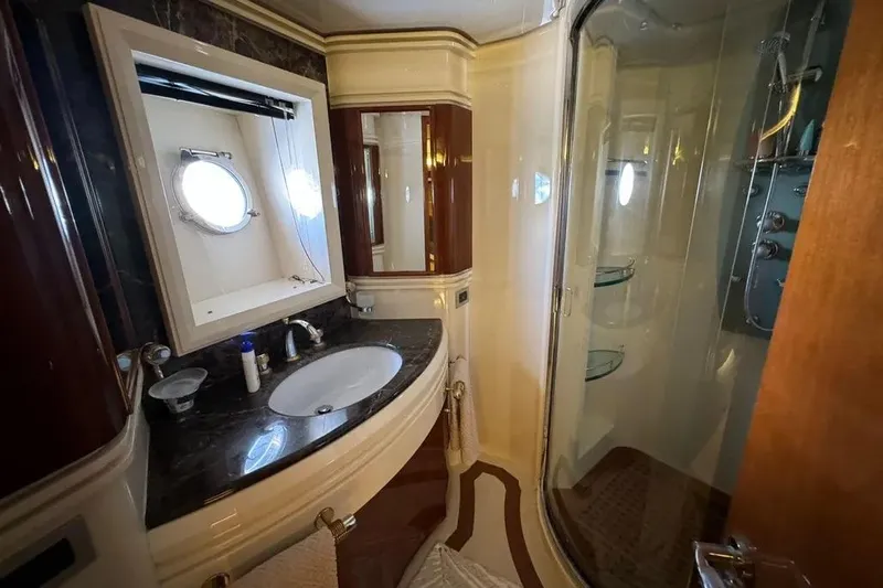  Yacht Photos Pics Luxurious bathroom on 2003 Azimut 98 Leonardo yacht with elegant fixtures and shower.