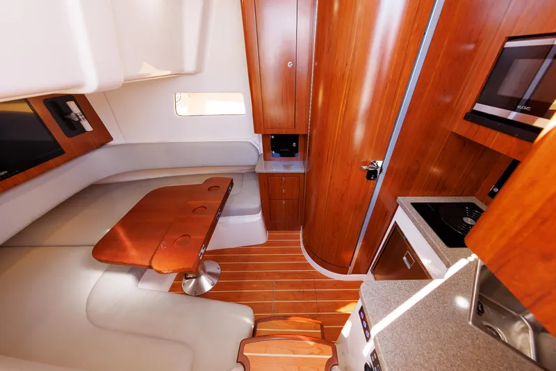 Nasty Hook II Yacht Photos Pics Regulator 41 NASTY HOOK II - Galley & Cabin Seating