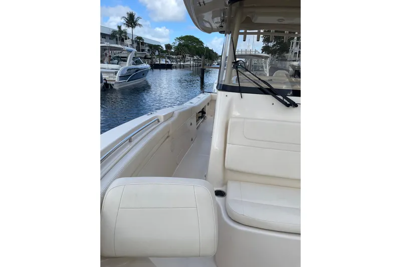  Yacht Photos Pics 2023 Grady-White Canyon 306 boat interior with waterfront view.