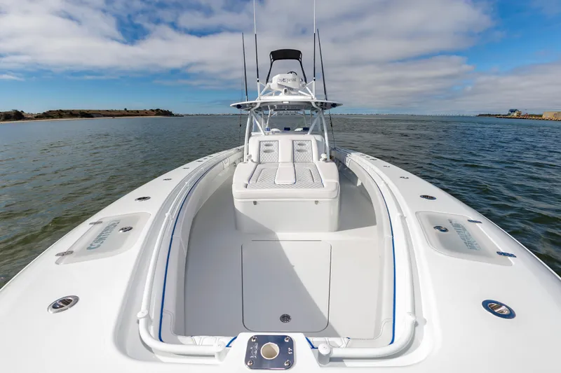 Fin Print Yacht Photos Pics 2023 Contender 44FA 44ST boat on water, showcasing sleek design and spacious deck.