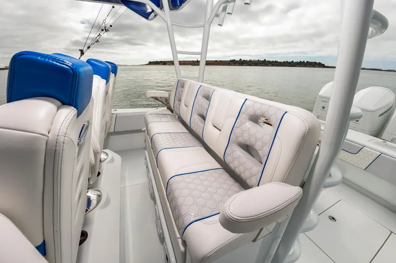 Fin Print Yacht Photos Pics 2023 Contender 44FA boat interior with luxurious seating and ocean view.
