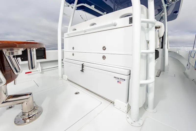 Fin Print Yacht Photos Pics 2023 Contender 44FA 44ST boat interior with storage and seating area.