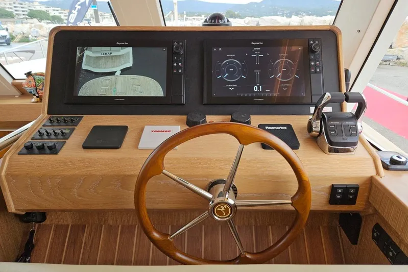  Yacht Photos Pics Helm of 2026 Sasga Yachts 55 with advanced navigation displays and controls.