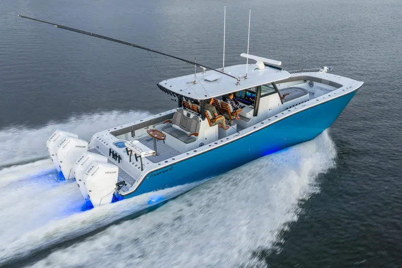  Yacht Photos Pics Modern Freeman 43 boat cruising on water, 2025 model, with powerful engines and sleek design.