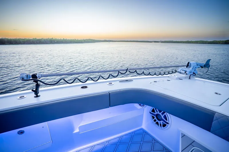  Yacht Photos Pics Freeman 43 boat deck overlooking serene water at sunset, 2025 model.