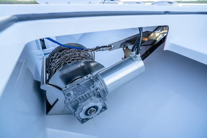  Yacht Photos Pics Anchor winch system on a 2025 Freeman 43 boat, showcasing chain and motor components.