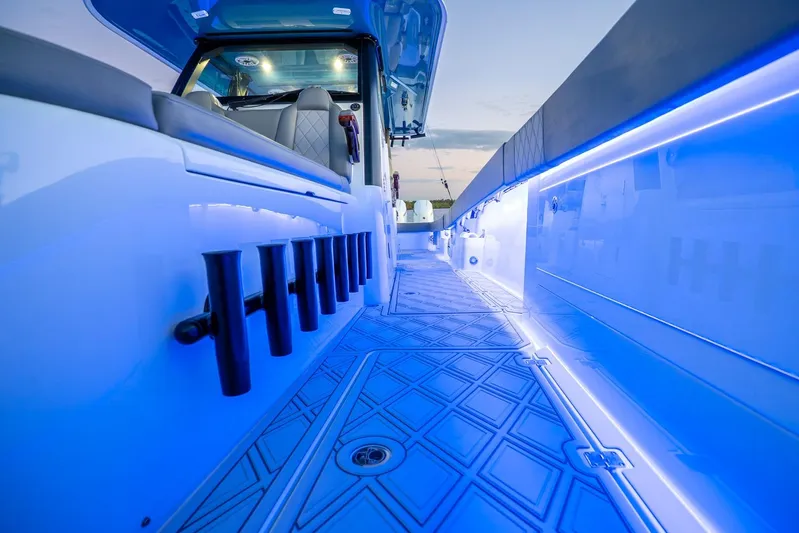  Yacht Photos Pics 2025 Freeman 43 boat interior with blue LED lighting and sleek design.