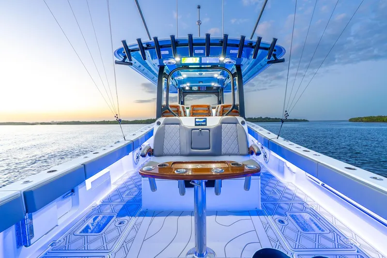  Yacht Photos Pics Luxurious 2025 Freeman 43 boat interior with modern design and ambient lighting on open water.