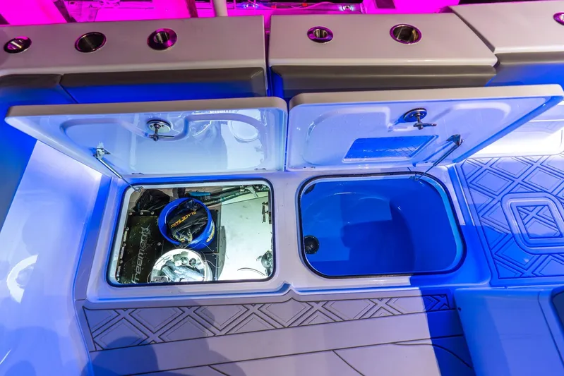  Yacht Photos Pics 2025 Freeman 43 boat interior with open storage compartments and modern lighting.