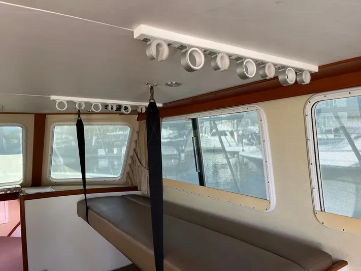  Yacht Photos Pics Interior of 1993 Radovich 34 boat with seating and windows.