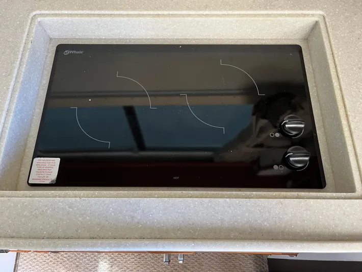  Yacht Photos Pics Ceramic cooktop with two knobs, set in a countertop, Radovich model 34, 1993.