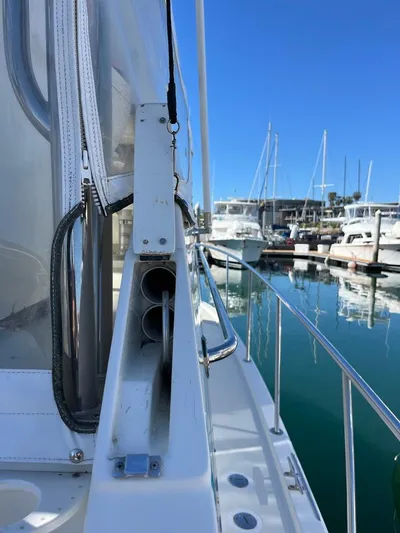  Yacht Photos Pics 1993 Radovich 34 yacht docked at a marina with clear blue skies.