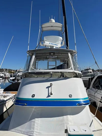  Yacht Photos Pics 1993 Radovich 34 boat docked at marina under clear blue sky.
