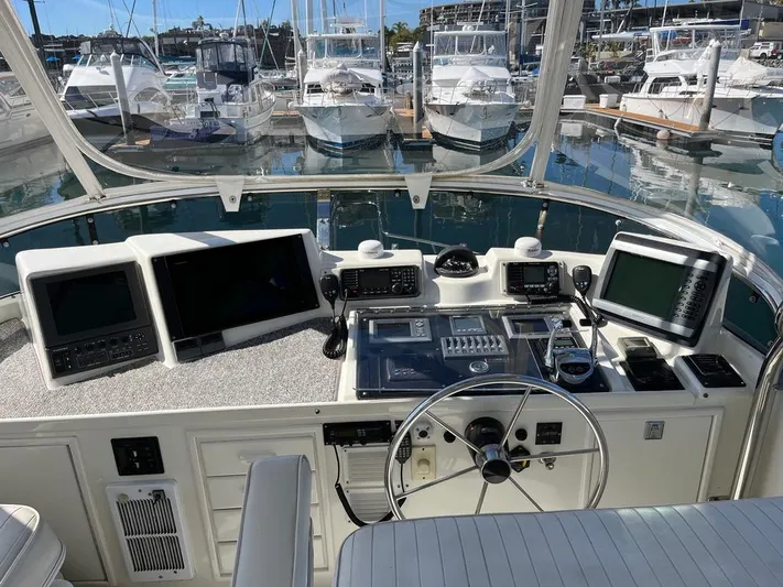 Yacht Photos Pics Cockpit of 1993 Radovich 34 boat with modern navigation equipment, docked at marina.