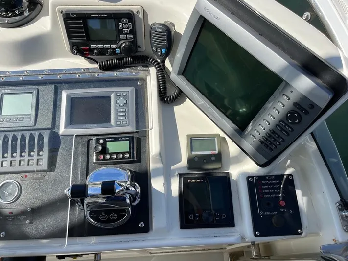  Yacht Photos Pics Control panel of a 1993 Radovich 34 boat with navigation and communication equipment.