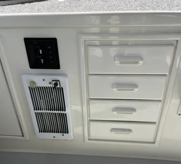  Yacht Photos Pics Control panel and drawers on a 1993 Radovich 34 boat interior.