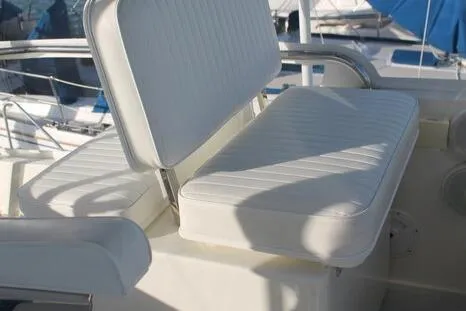  Yacht Photos Pics White cushioned seating on a 1993 Radovich 34 boat deck.