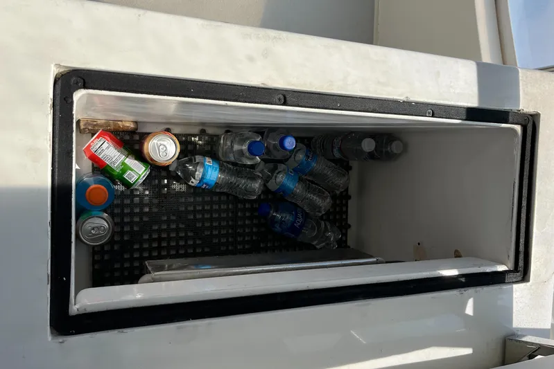  Yacht Photos Pics Cooler on Radovich 34 boat with assorted drinks, including water bottles and cans.