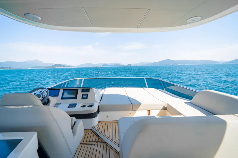  Yacht Photos Pics Luxury yacht Absolute 56 FLY 2022, featuring spacious deck and stunning ocean view.