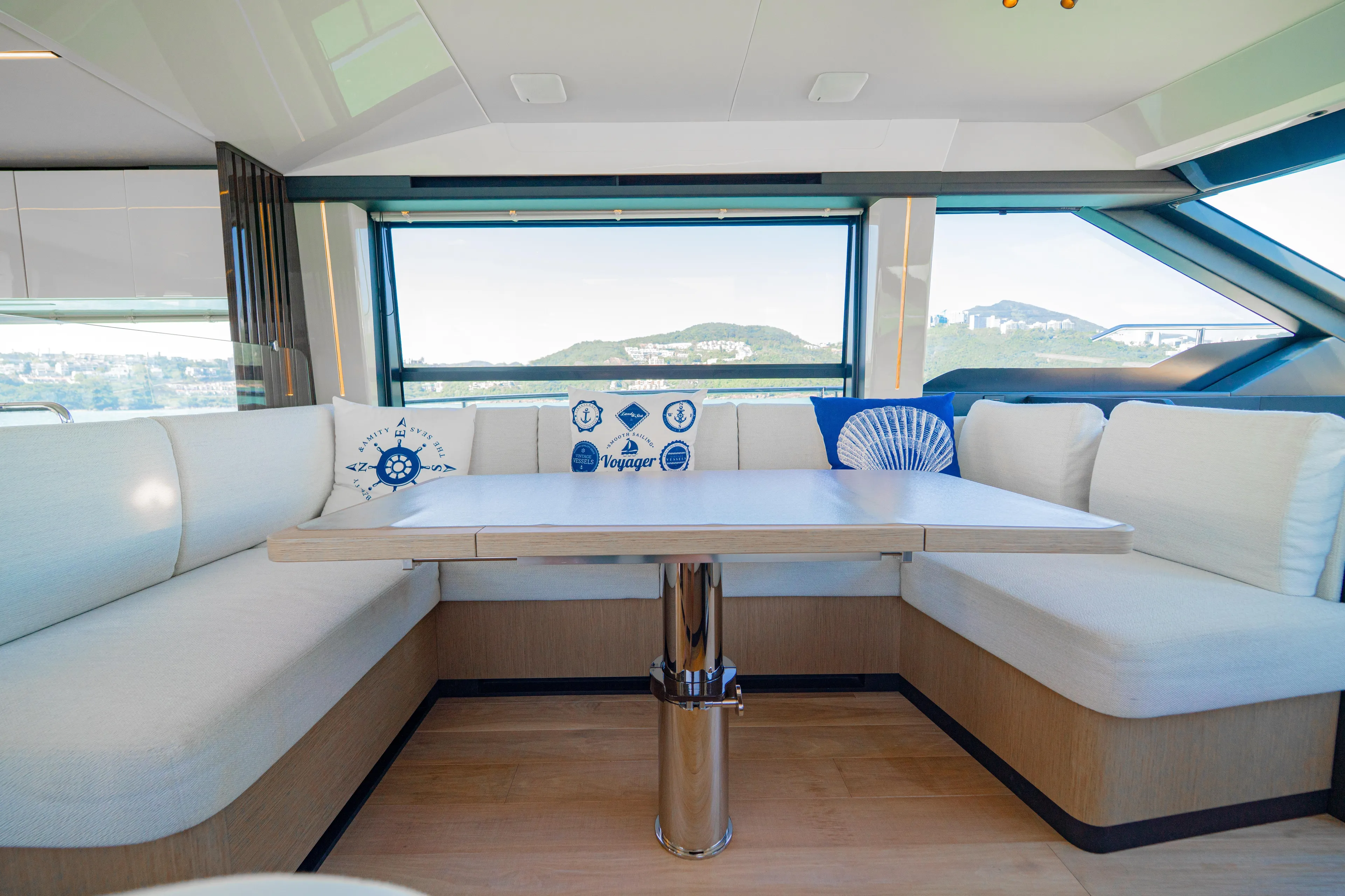  Yacht Photos Pics Luxurious interior of 2022 Absolute 56 FLY yacht with scenic window view.