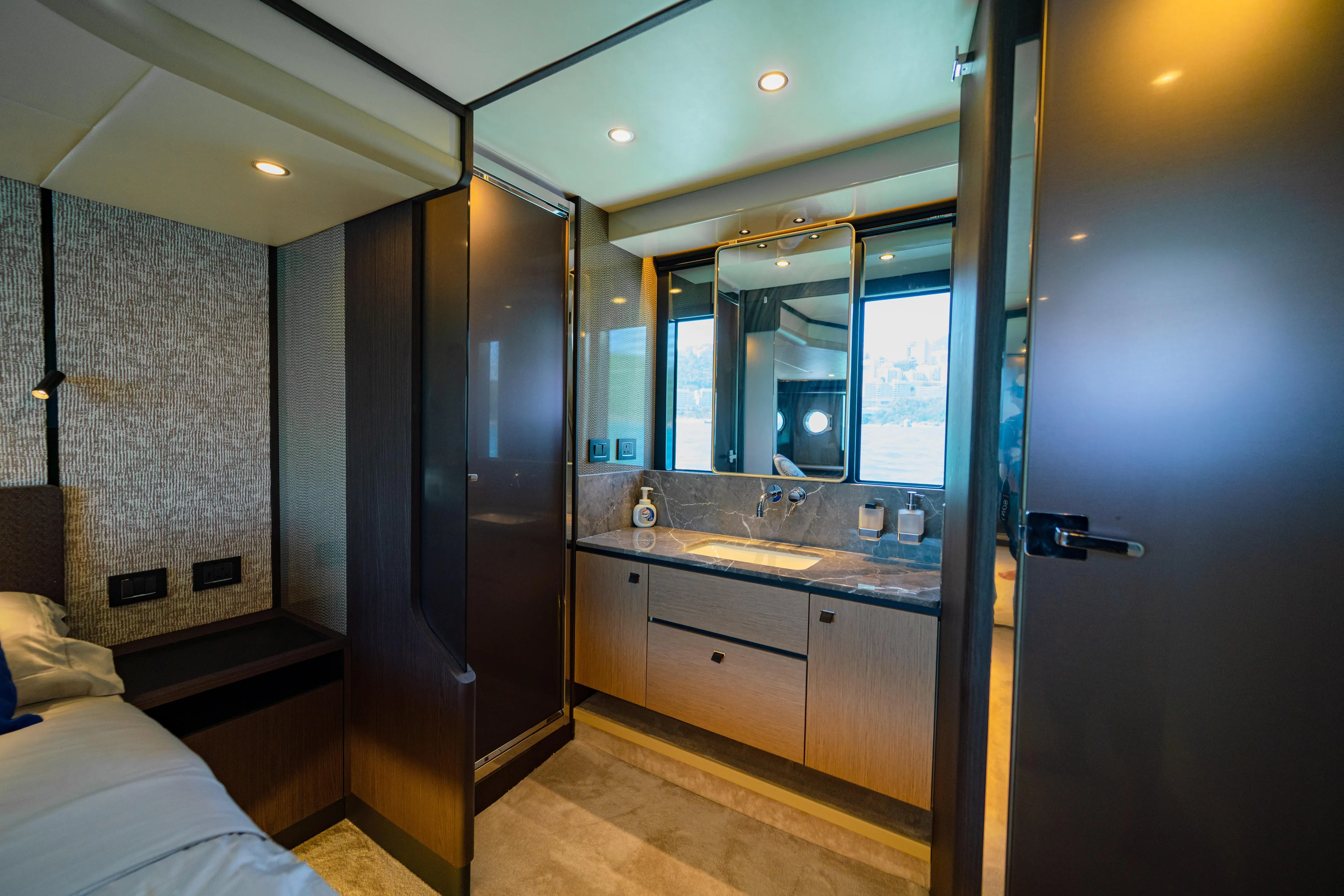  Yacht Photos Pics Luxurious interior of 2022 Absolute 56 FLY yacht with modern bathroom design.