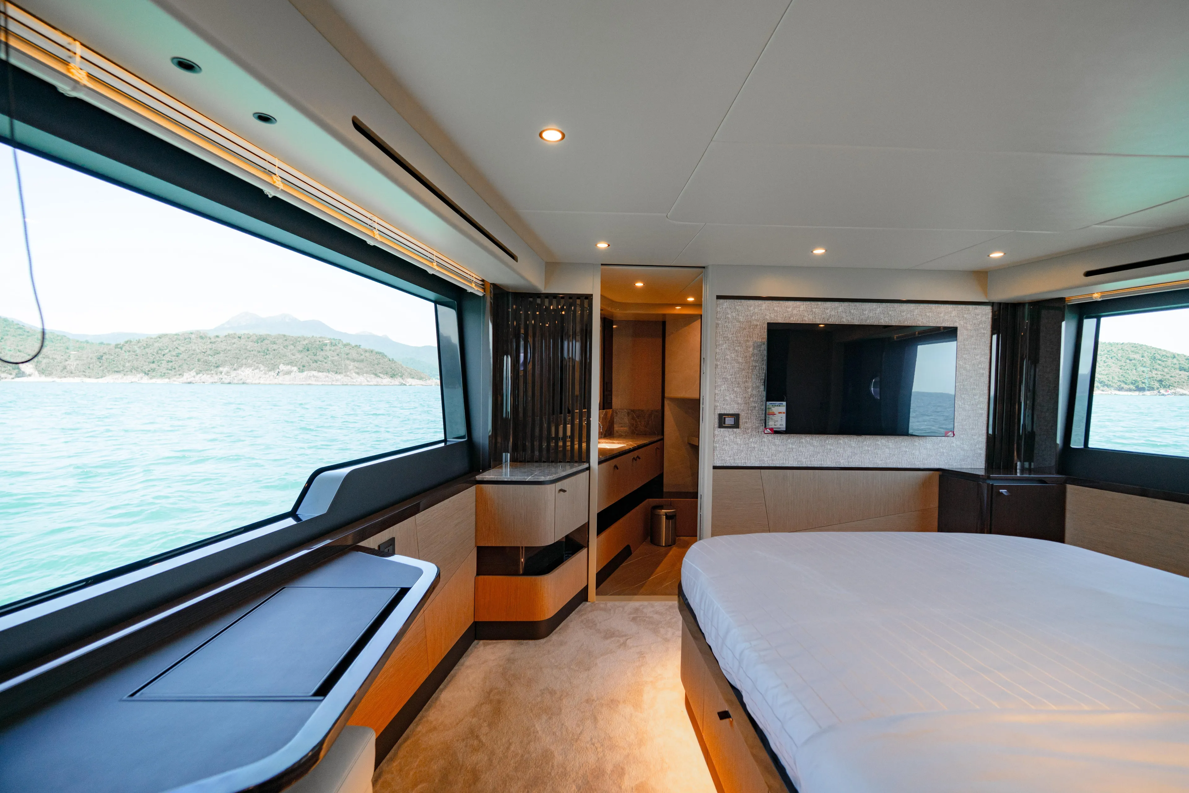  Yacht Photos Pics Luxurious interior of 2022 Absolute 56 FLY yacht with scenic ocean view.