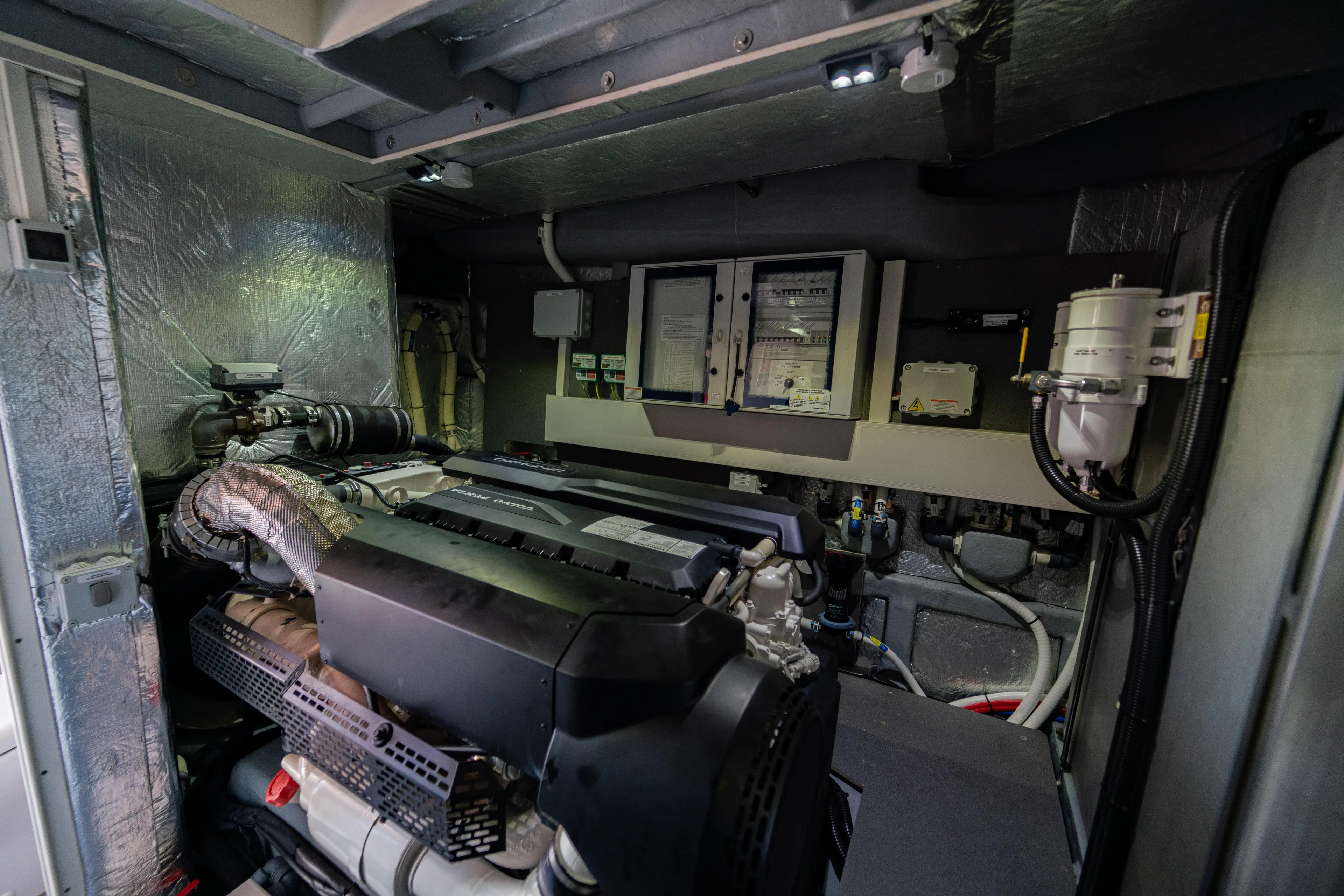  Yacht Photos Pics Engine room of 2022 Absolute 56 FLY yacht, showcasing advanced machinery and equipment.