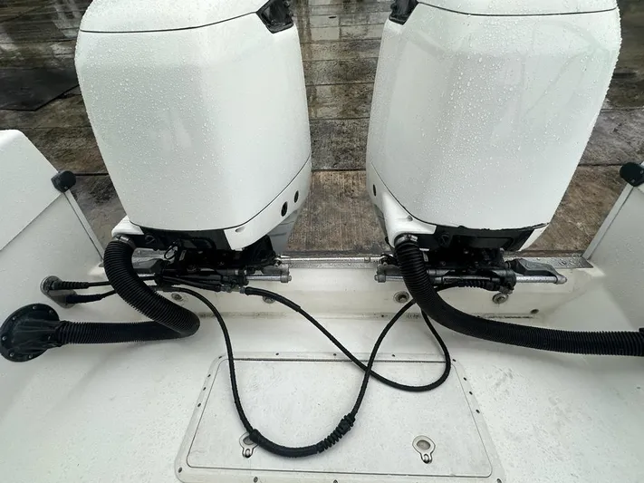  Yacht Photos Pics Twin outboard motors on a 2002 Ocean Master 31 Center Console boat.