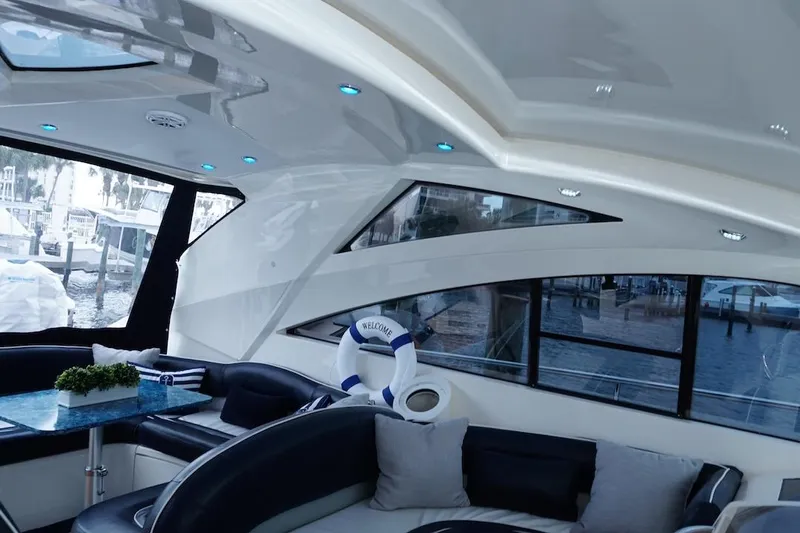  Yacht Photos Pics Luxurious interior of 2009 Fairline 52 Targa yacht with modern seating and decor.