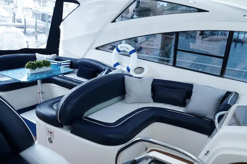  Yacht Photos Pics Luxurious interior of 2009 Fairline 52 Targa yacht with elegant seating and decor.