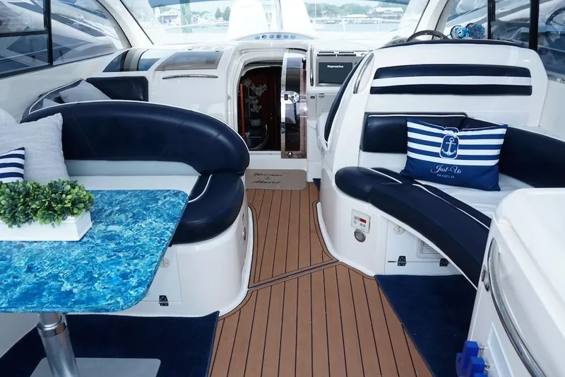  Yacht Photos Pics Luxurious interior of 2009 Fairline 52 Targa yacht with elegant seating and decor.