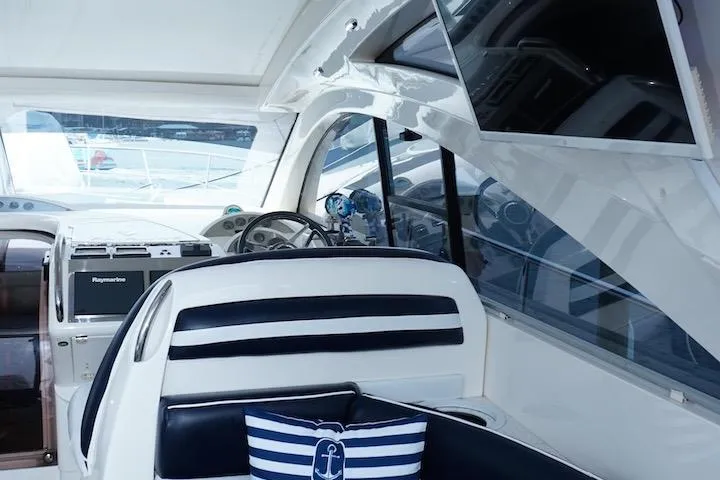  Yacht Photos Pics Interior of 2009 Fairline 52 Targa yacht with modern helm and nautical decor.