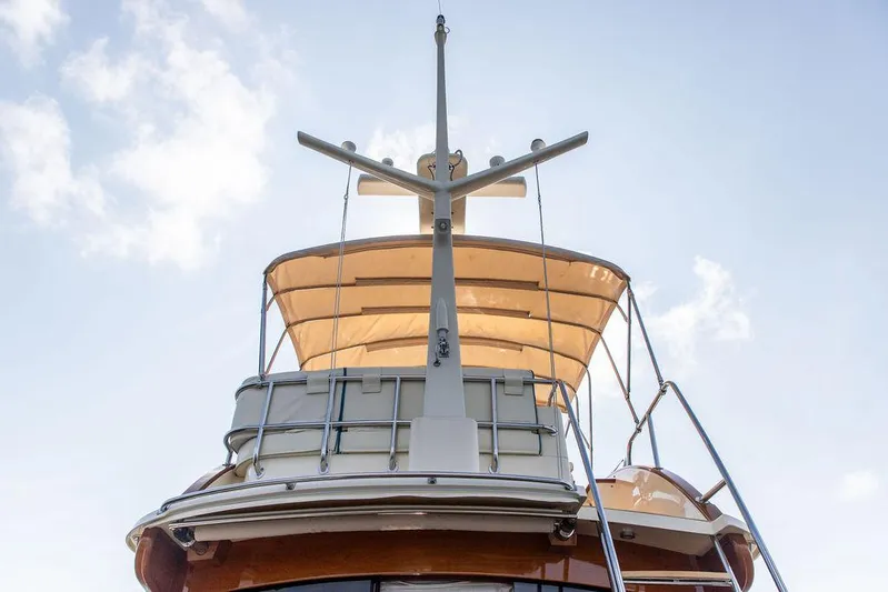 Paddy Wagon Yacht Photos Pics Hinckley Talaria 43 Flybridge 2017, view of flybridge and canopy against blue sky.