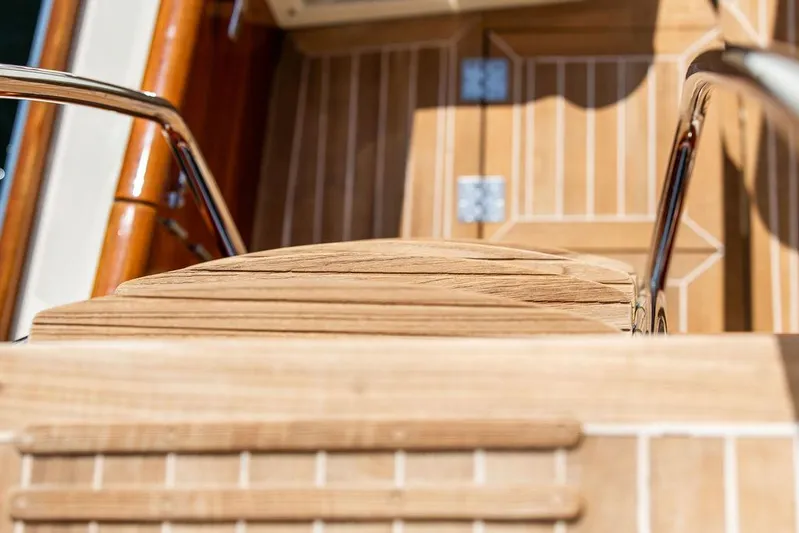 Paddy Wagon Yacht Photos Pics Teak steps and railing on 2017 Hinckley Talaria 43 Flybridge yacht.
